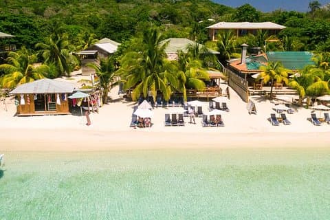 Ultimate West Bay Beach Day: Pass & Transfers Included
