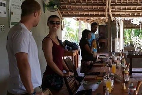 Cours de cuisine Thuan Tinh d'une demi-journée avec promenade en barque à rames