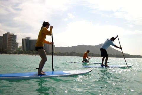 Private gruppe SUP lektioner for 4 af Waikiki Beachboys på Royal