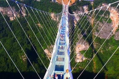 Excursão privada de 1 dia para a ponte de vidro e a caverna do dragão amarelo