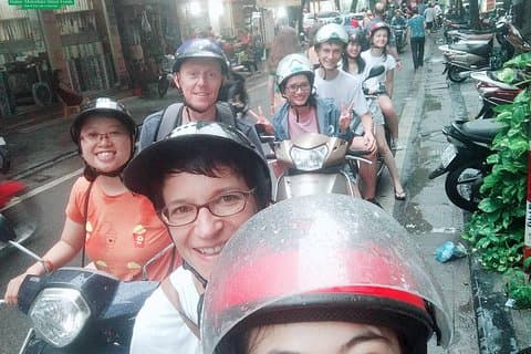 Excursão guiada de meio dia de motocicleta em Hanói com embarque no hotel