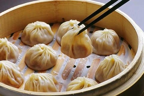 Tour nocturno privado en Beijing con cena Din Tai Fung