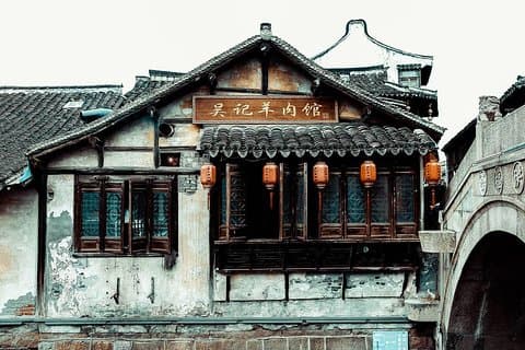 Tour privado de escala de Shangai a la antigua ciudad de Xinchang con almuerzo