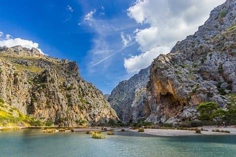 Excursão de um dia inteiro em Maiorca de trem, bonde e barco