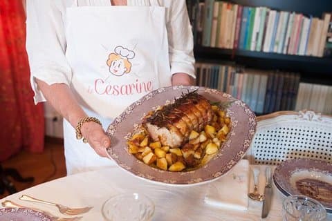 Dining experience at a local's home in Predappio with cooking demo