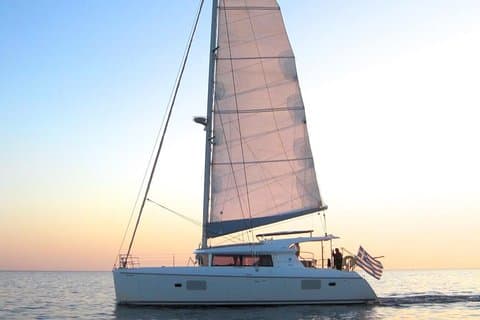 Viaje clásico al atardecer compartido desde Santorini por las famosas playas