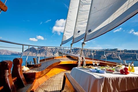 Santorini Caldera Sunset Sailing Cruise with Dinner and Wine