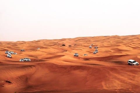 Dubai Desert Safari Red Dune: BBQ, Camel Ride & Sandboarding