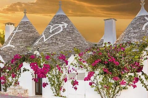 Full-day tour Alberobello & Locorotondo & Polignano a Mare & Bari