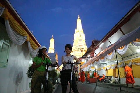Bangkok at Night by Electric Scooter