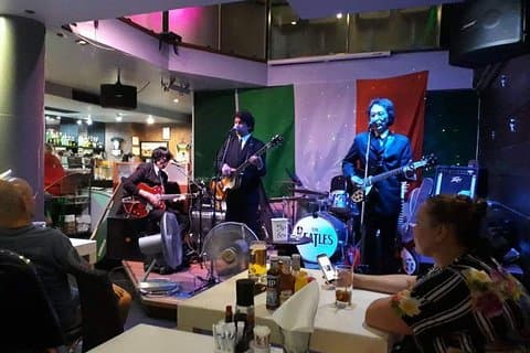 Book a table for dinner to see the Bangkok Beatles