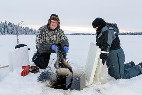 Ice Fishing in motoslitta da Levi, Finlandia