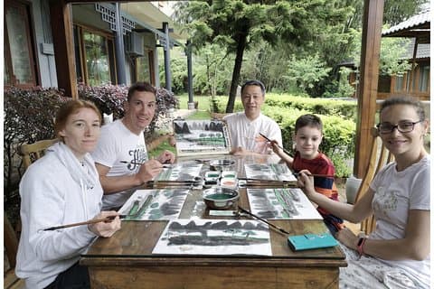 1 日の文化体験: 太極拳、料理、絵画のレッスン