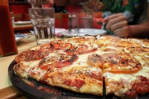 Tour privato a piedi e degustazione di pizze argentine
