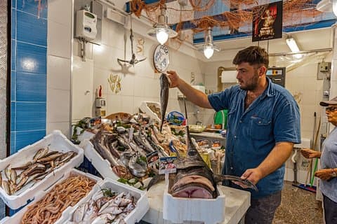 Market visit and Dining experience at a Local's home with Wine in Amalfi