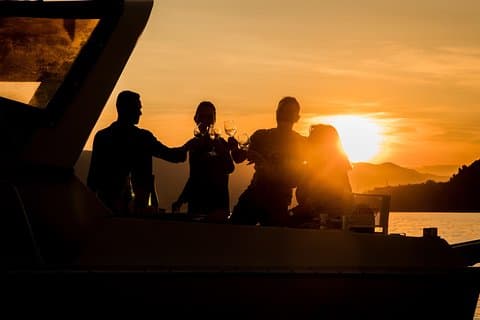 Romance in Cinque Terre: a boat trip at sunset, aperitif onboard