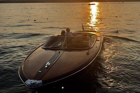 Luxury cruise on Lake Como on a Riva speedboat, with italian wine