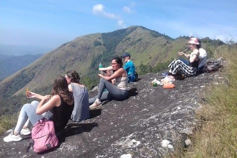 Munnar mountain hike and sunset view- (with one night stay)