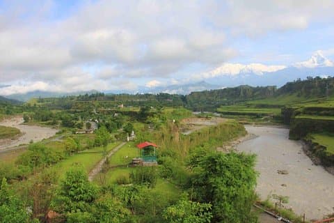 Excursión de un día a la aldea de Osho Upaban desde Pokhara