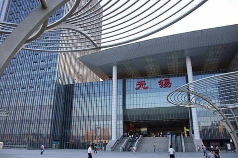 Transfert privé à l'arrivée de la gare de Wuxi dans la ville