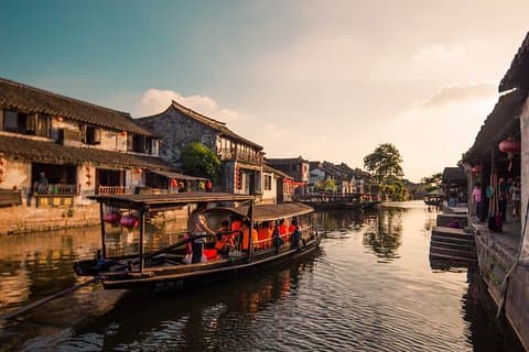 Traslado privado de ida y vuelta a la ciudad acuática de Xitang desde Hangzhou