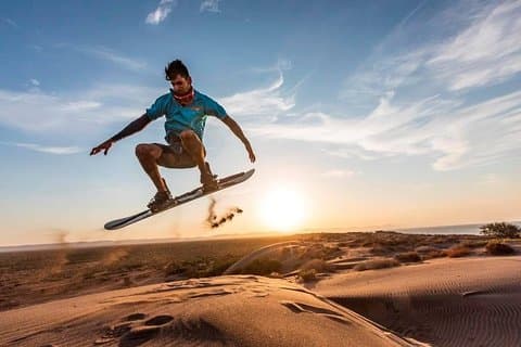 Sunset Sandboarding bij La Paz Dunes Tour