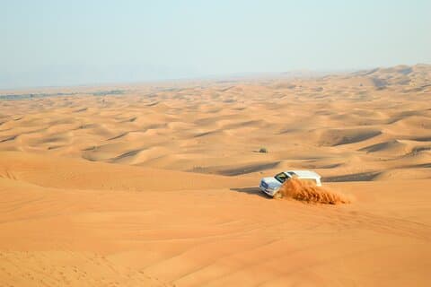 Full-Day Guided Red Dunes Desert Tour in Dubai with Camel Ride