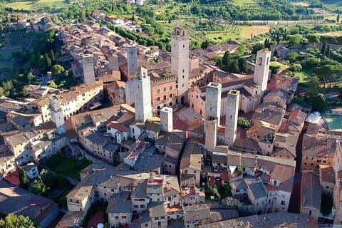 Excursão guiada privada de dia inteiro: Siena, San Gimignano com almoço