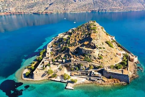 Excursão de barco guiada de dia inteiro com almoço na ilha Spinalonga