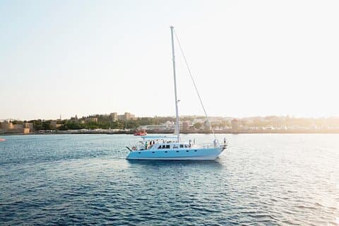Private Catamaran Day Sailtrip from Rhodes to Tsampika Beach via Anthony Quinn
