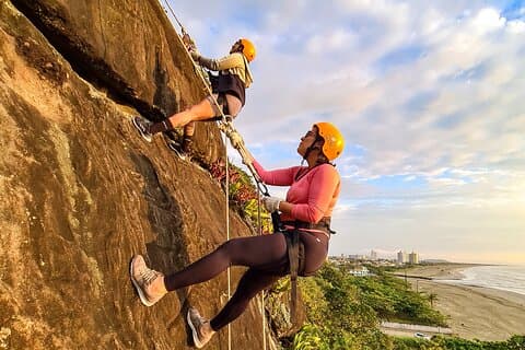 Rappelling at Costão Beach