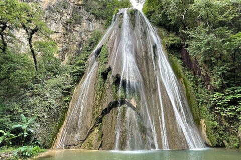 Private/Group Cola de Caballo Waterfall & Santiago (Premium SUV)