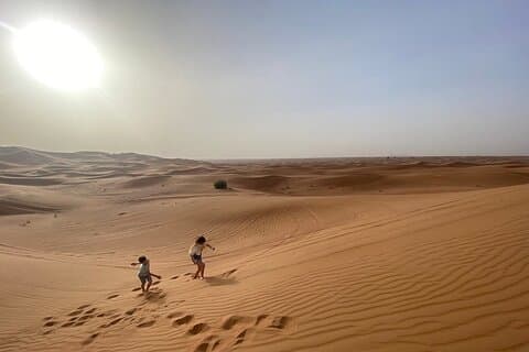 Morning Desert Safari with Dune Bashing, Camel Ride, Sand Board & Quad Biking