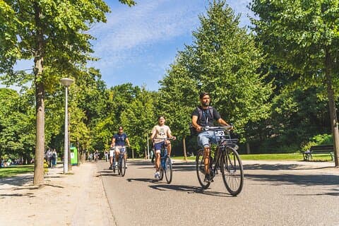 Amsterdam Small-Group Bike Tour With Canal Cruise, Drinks, Cheese