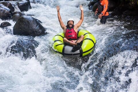 Guachipelin Zipline, River Tubing, Horseback Ride, Hot springs & Lunch Combo