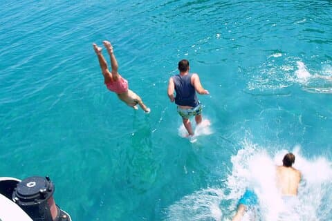 Full Day Boat Tour of Corfu and Mainland Greece with beach BBQ