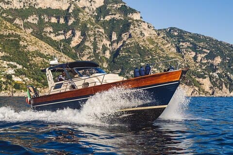 Sorrento to Capri Private Boat Experience on a Gozzo Apreamare 10