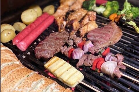 Rooftop Brazilian BBQ with Caipirinhas and Art