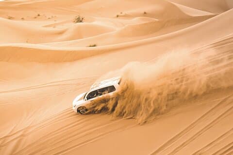 Dubai: Morning Desert Safari with Camel Ride & Sandboarding