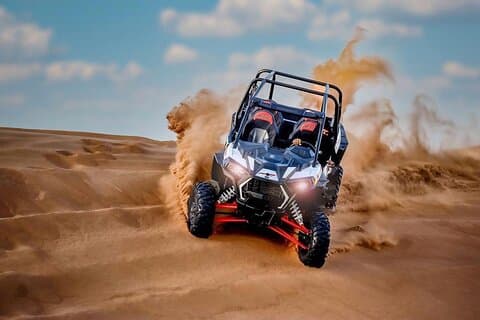 Sunset Buggy Ride with Sandboarding and Camel Ridding