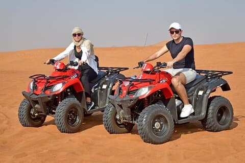 Morning Desert Safari Quad-bike camel ride Sand Surfing in Dubai