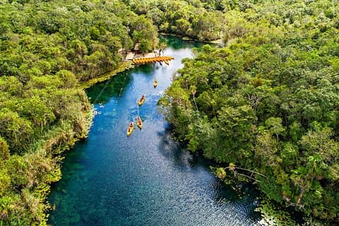 Tour del Cenote Tankah e del villaggio Maya con zipline, canoe e pranzo