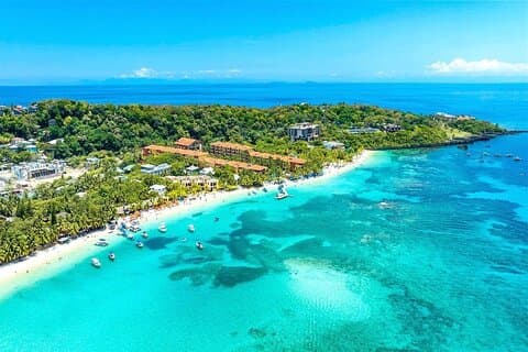 Roatán West Bay Beach Club avec chauffeur privé