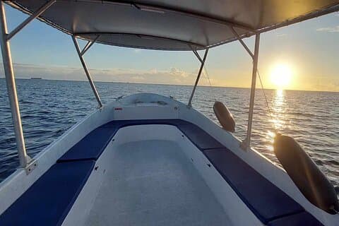 Boat ride at sunset over the Raiatea lagoon