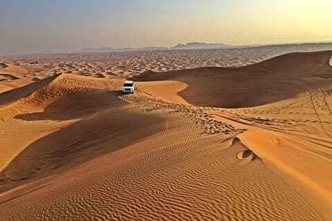 Campamento Premium Red Dune Desert Safari Paseo en camello y sandboarding