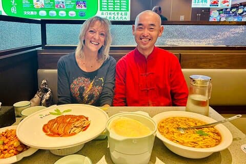 Tour privado de 3 horas por Hutong, clase de caligrafía y pato pequinés