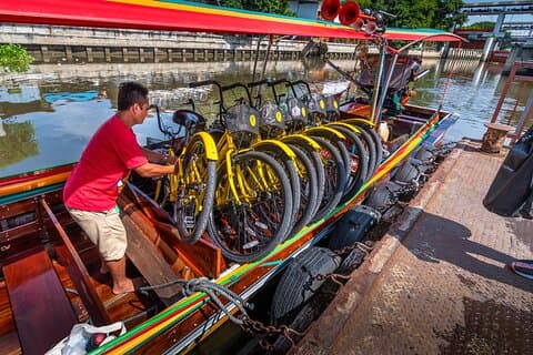 Tour guiado de medio día en barco y bicicleta para grupos pequeños en Bangkok