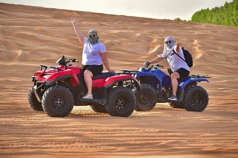 Dubai Desert Safari with Quad Bike, Camel Ride, Sandboard and BBQ