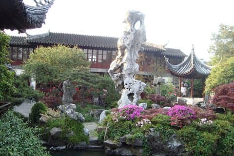 Shanghai till Suzhou med kultåg besök trädgårdar och kanaltur.