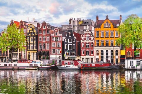 Tour privato di un giorno dei punti salienti della città vecchia di Amsterdam in auto